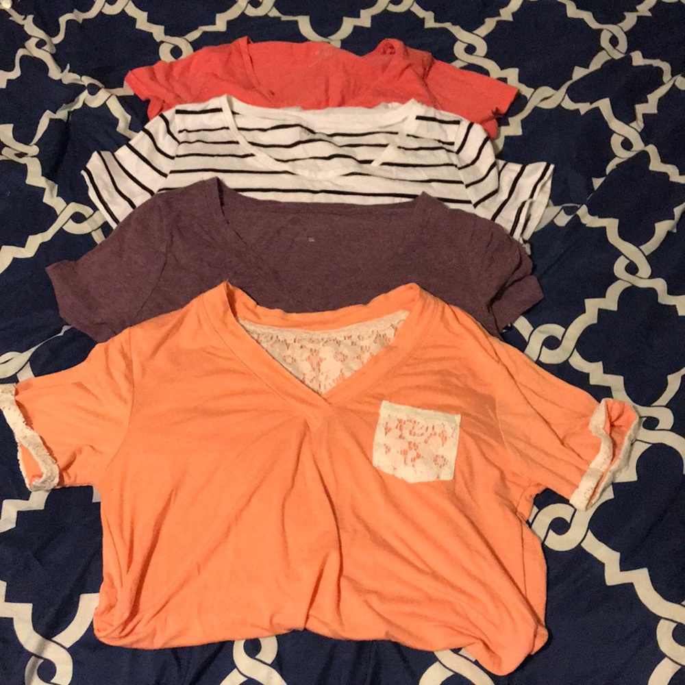 Lot of maternity t shirts.